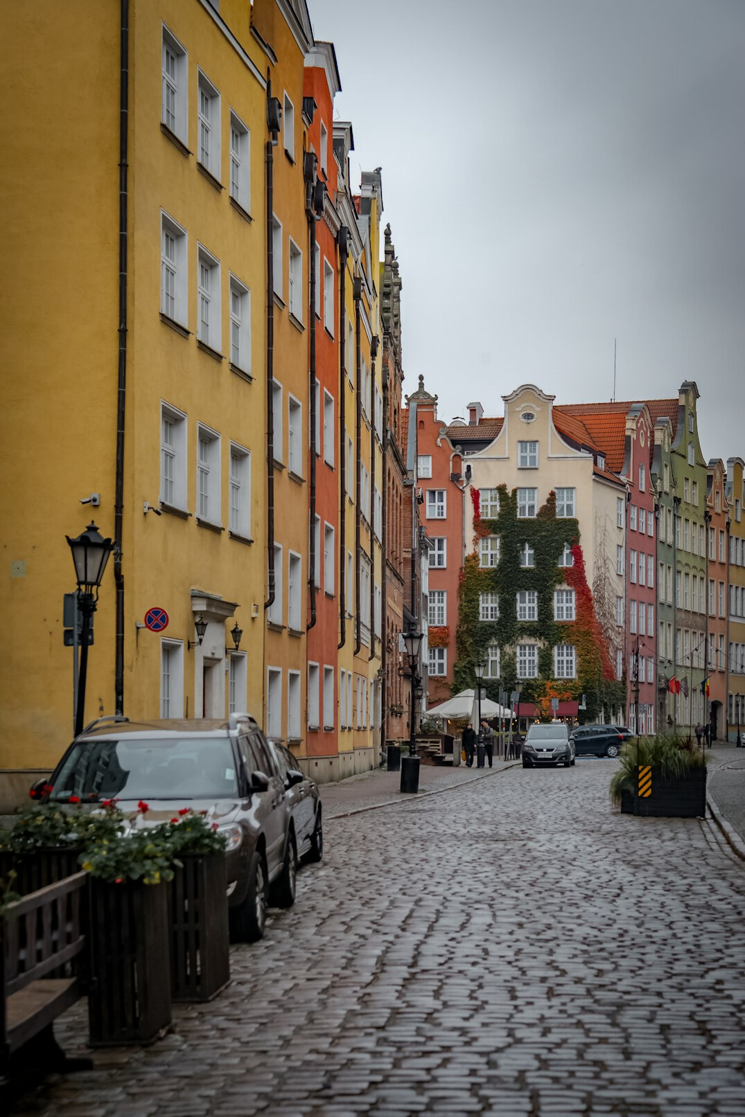 Historic old town street in Poland with colorful tenement houses